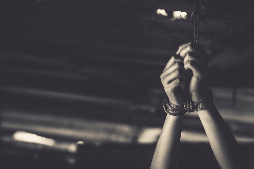 Vista Torture Charges Under California Penal Code Section 206 (PC) 1 Hands tied to the ceiling to illustrate california torture law 206 (PC)