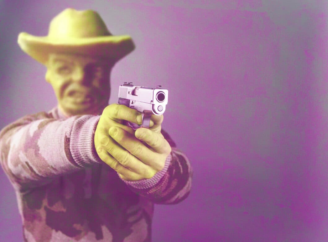 The Concept of Imperfect Self Defense and When it Can be Used in Vista 1 A man holding a gun to illustrate imperfect self defense definition and examples