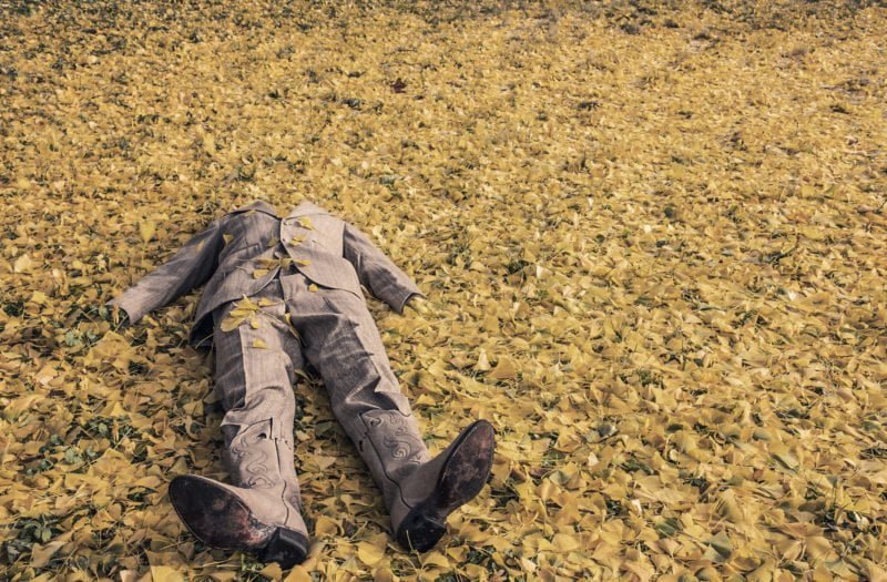 Is Hiding a Body a Crime in Vista, California? 1 A suit on a pile of leaves that illustrates the issue of concealing an accidental death california