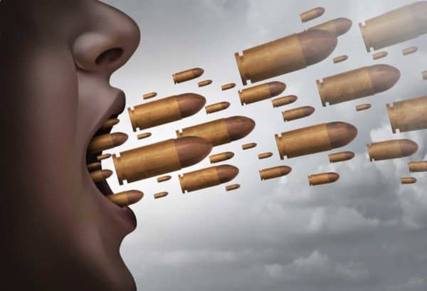 Criminal Threats Charges in California (422 & 422.3 (PC)) 1 Bullets falling from someone's mouth to symbolize criminal threats charges under 422 (PC)